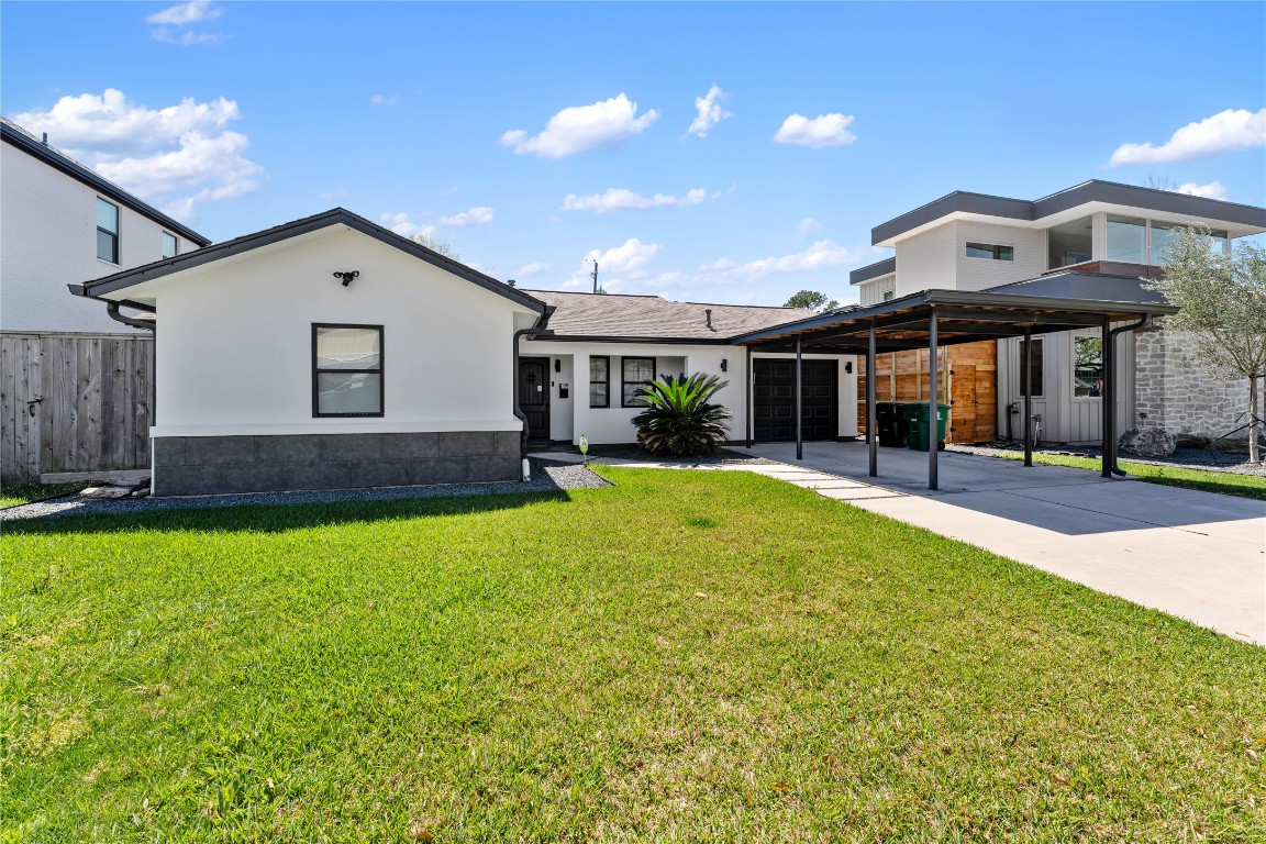 6623 Housman Houston, TX 77055 - Photo 3 of 38 a swimming pool view with a seating space and a garden view