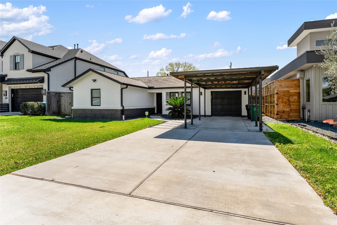 6623 Housman Houston, TX 77055 - Photo 38 of 38 a front view of house with yard and green space
