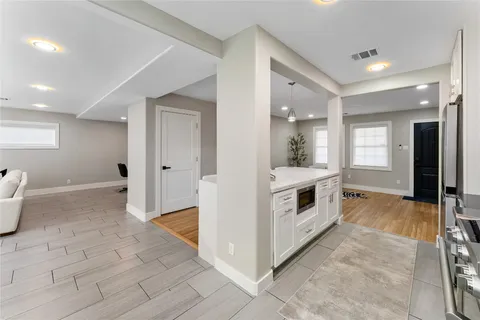 a view of a livingroom with furniture and window