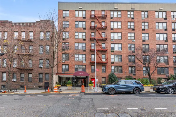 a cars parked in front of a building