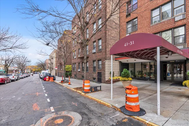 a view of a street with cars