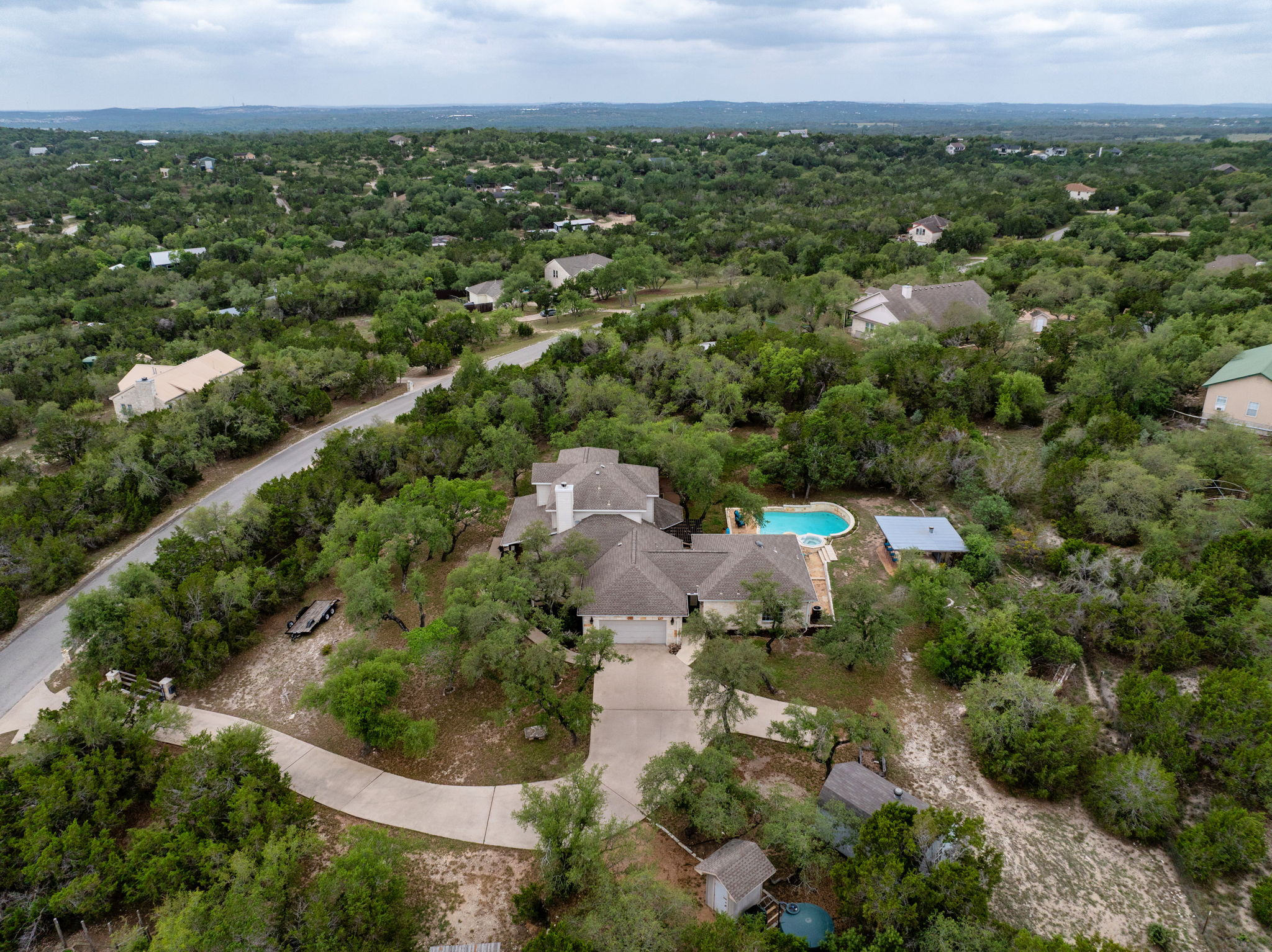 14815 Avery Ranch Boulevard, Unit 1401 Austin, TX 78717 - Photo 34 of 38 Expansive property with a circular driveway and mature trees