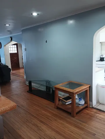 a room with a table and a mirror