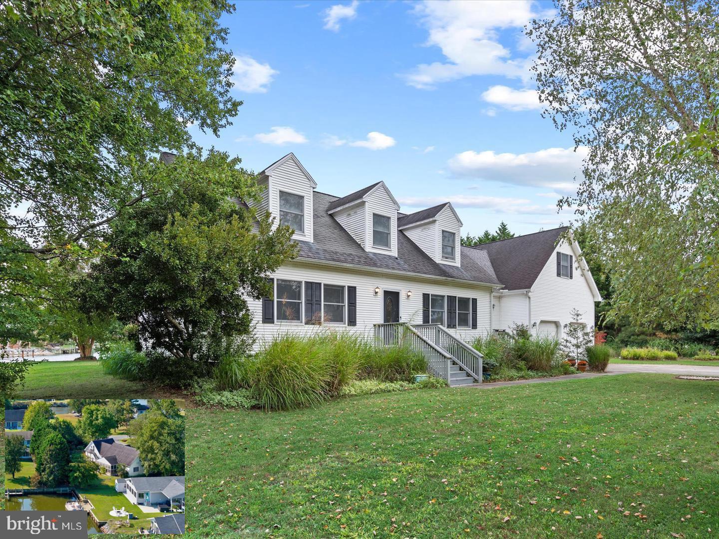 13374 Cove Landing Road Bishopville, MD 21813 - Photo 1 of 108 a view of a house with garden and yard