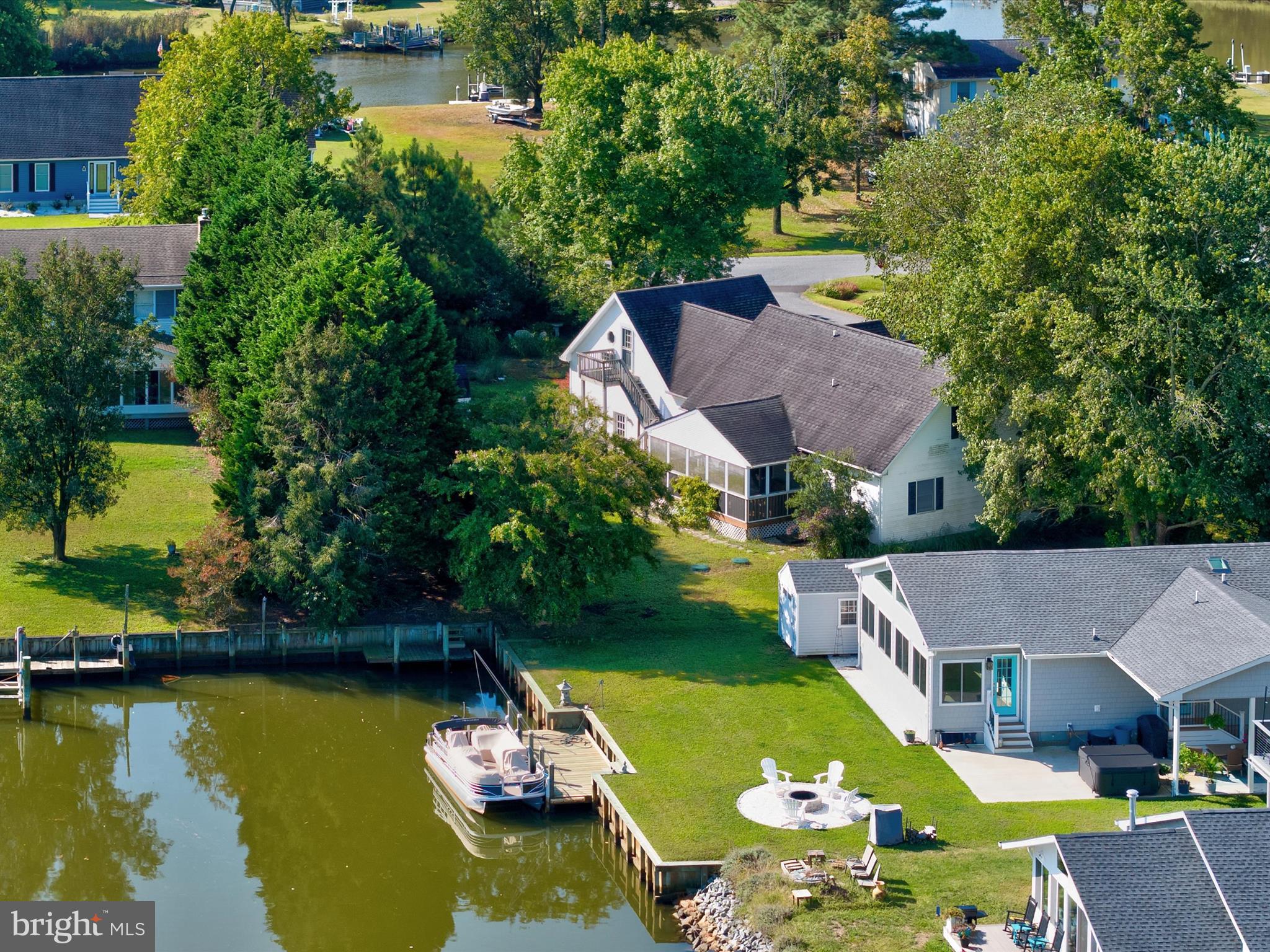 13374 Cove Landing Road Bishopville, MD 21813 - Photo 4 of 108 an aerial view of residential houses with outdoor space and swimming pool