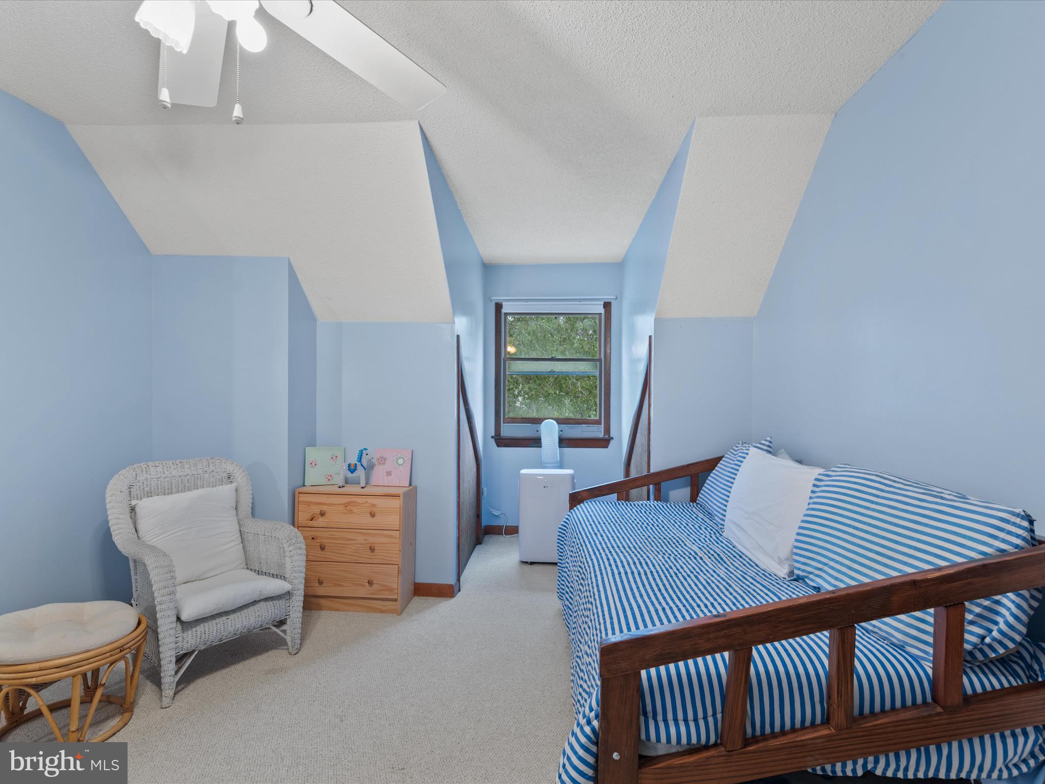 13374 Cove Landing Road Bishopville, MD 21813 - Photo 51 of 108 a bedroom with furniture and a window