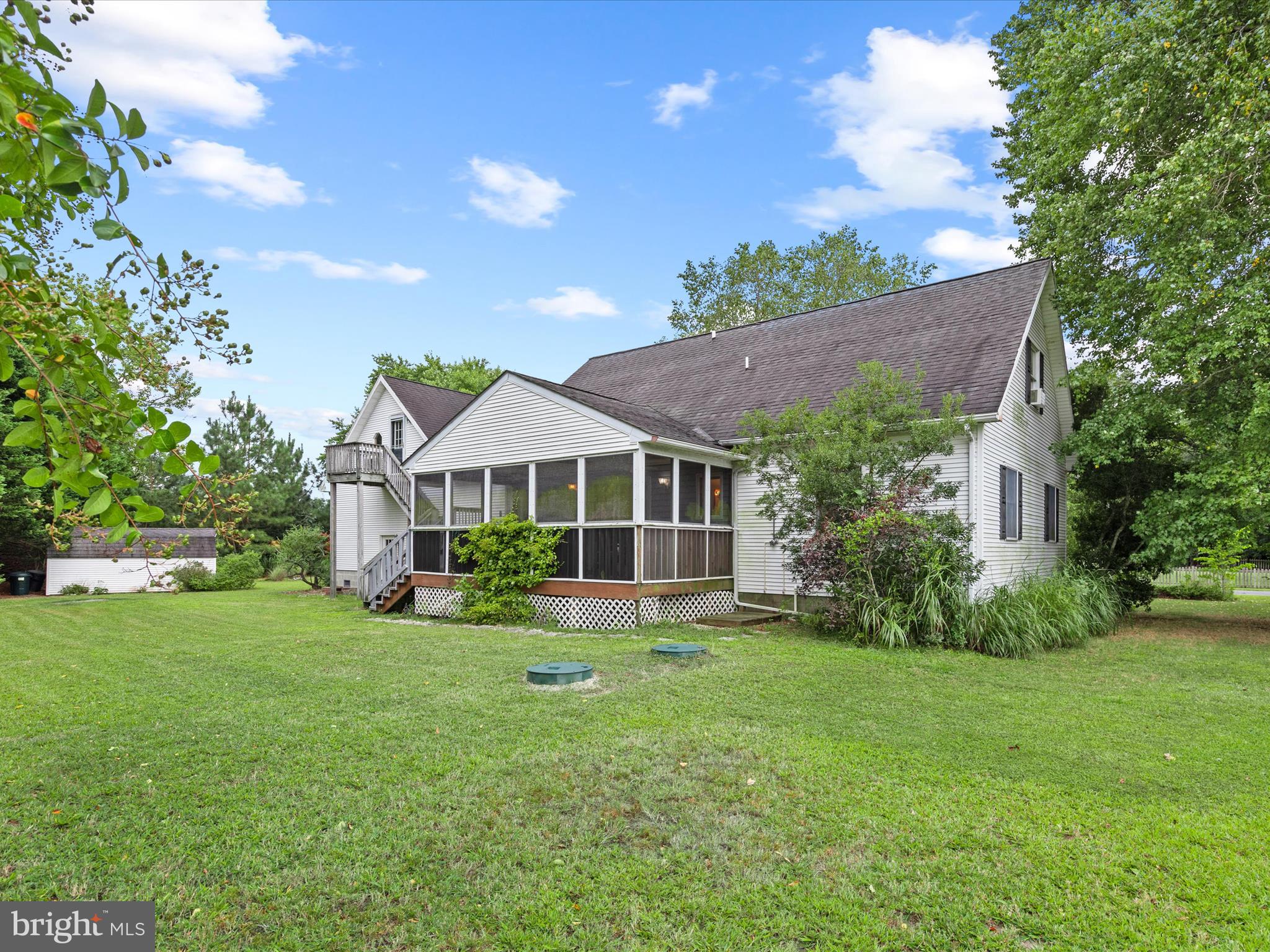 13374 Cove Landing Road Bishopville, MD 21813 - Photo 72 of 108 a front view of a house with a yard