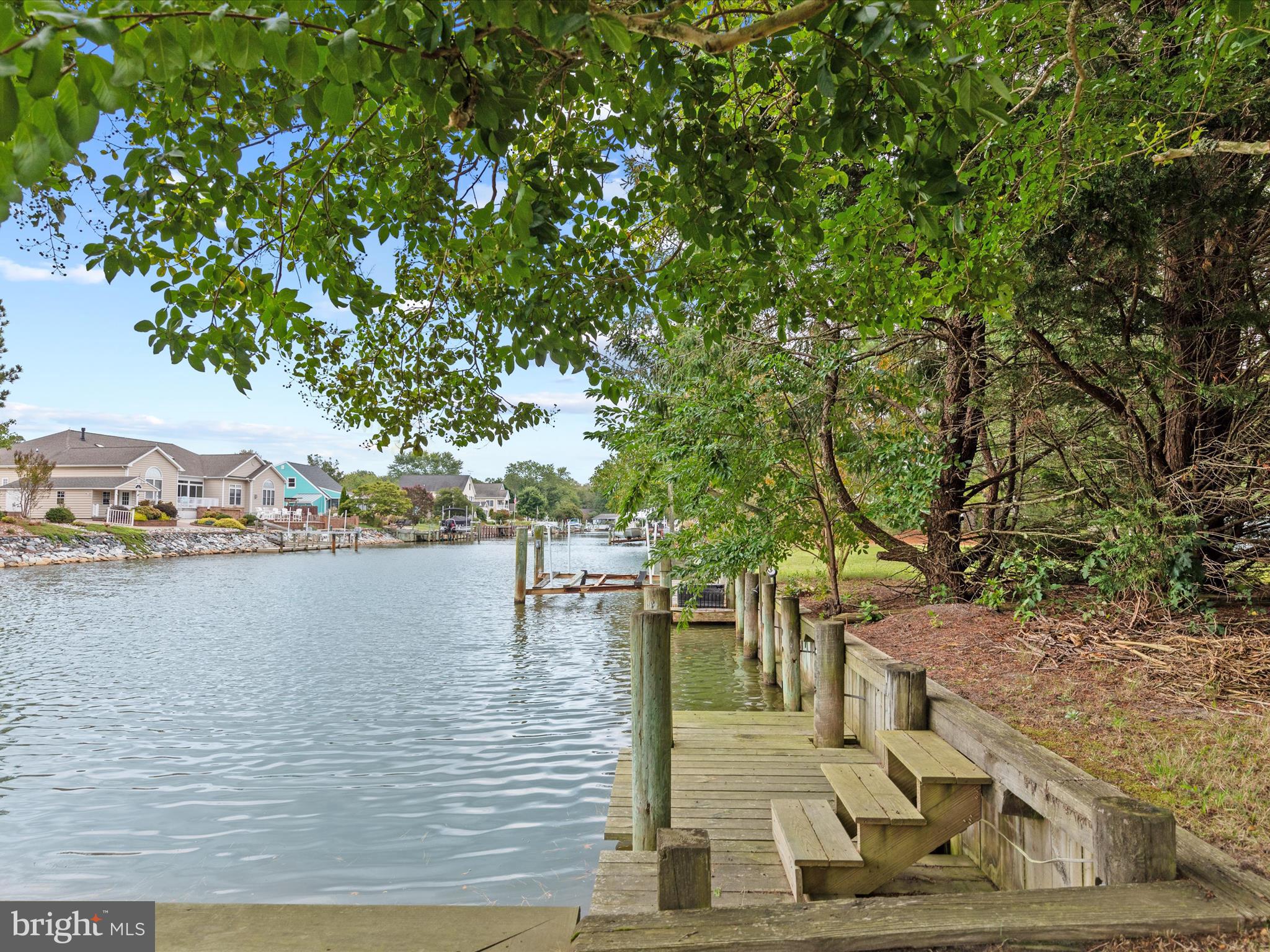 13374 Cove Landing Road Bishopville, MD 21813 - Photo 82 of 108 a view of a lake with houses