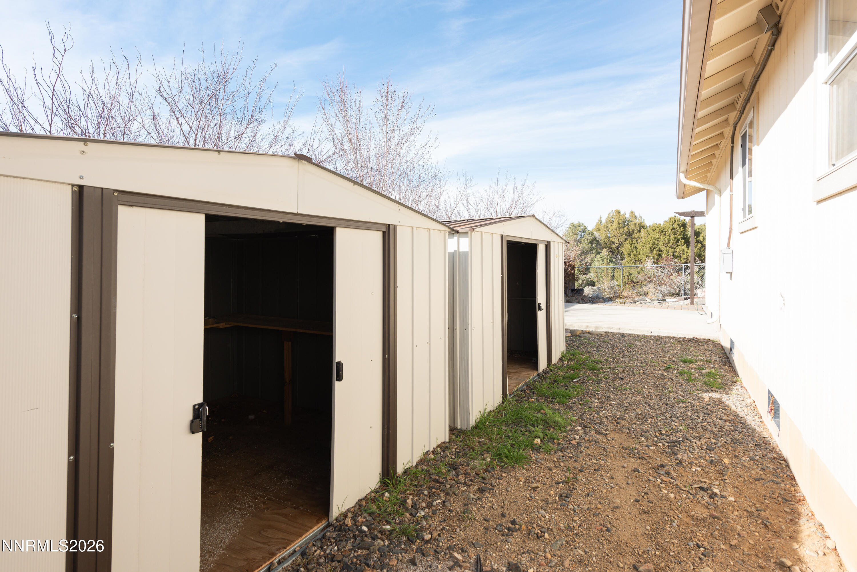 44 Conner Way Gardnerville, NV 89410 - Photo 35 of 38 a view of a back yard from a hallway