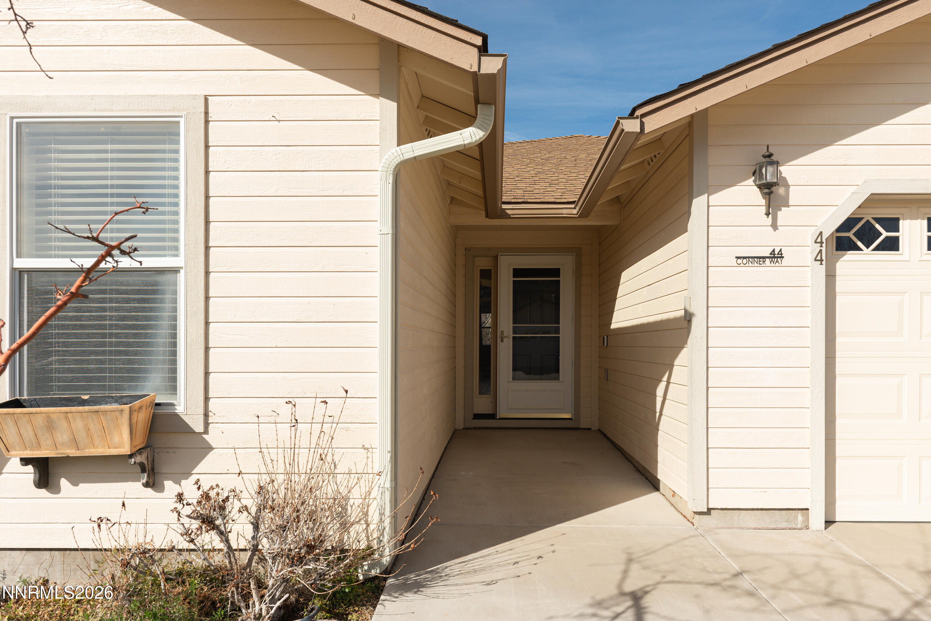 44 Conner Way Gardnerville, NV 89410 - Photo 4 of 38 a view of a house with a backyard