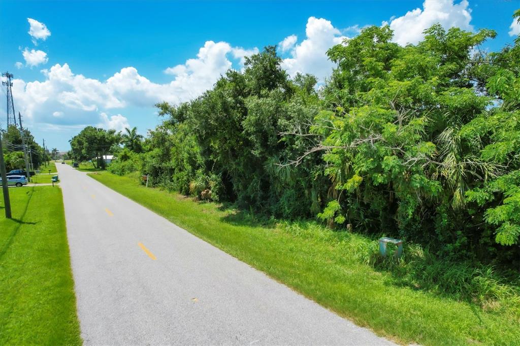 1010 Lavilla Road Punta Gorda, FL 33950 - Photo 9 of 19 a view of a house with a big yard