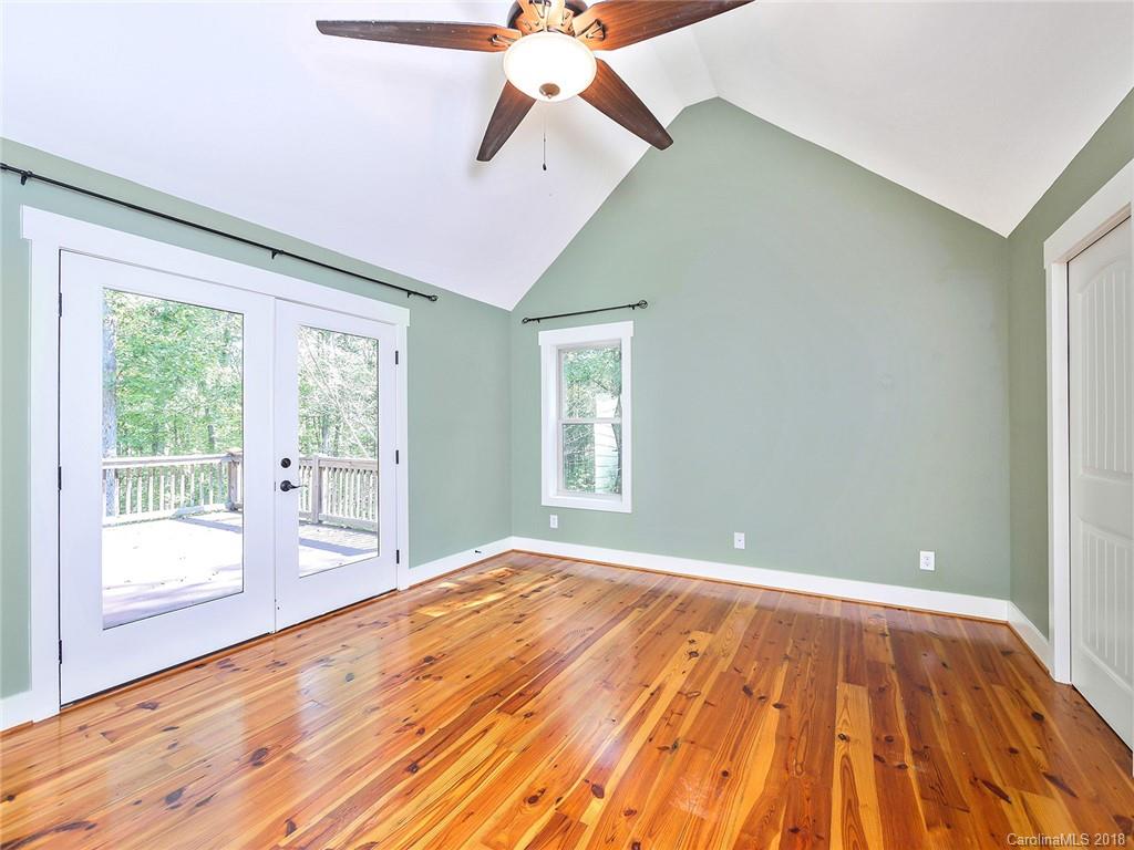 4183 Ricks Road Sharon, SC 29742 - Photo 14 of 33 a view of an empty room with wooden floor and a window