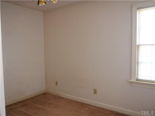 2900 Bannf Court Raleigh, NC 27604 - Photo 13 of 19 an empty room with a window