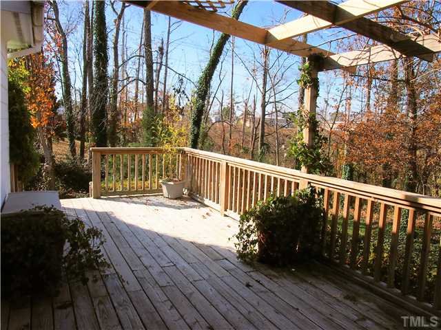 2900 Bannf Court Raleigh, NC 27604 - Photo 17 of 19 a view of balcony with wooden floor
