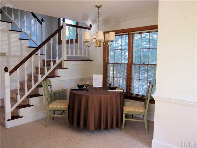 2900 Bannf Court Raleigh, NC 27604 - Photo 6 of 19 a view of entryway with workspace and stairs