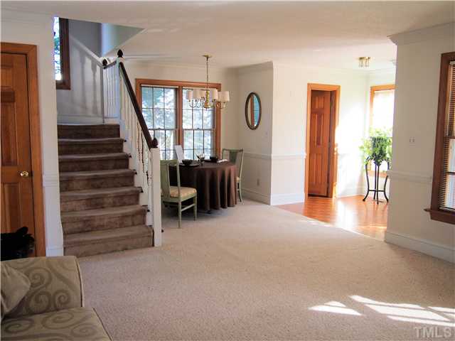 2900 Bannf Court Raleigh, NC 27604 - Photo 7 of 19 a view of livingroom with furniture and stairs