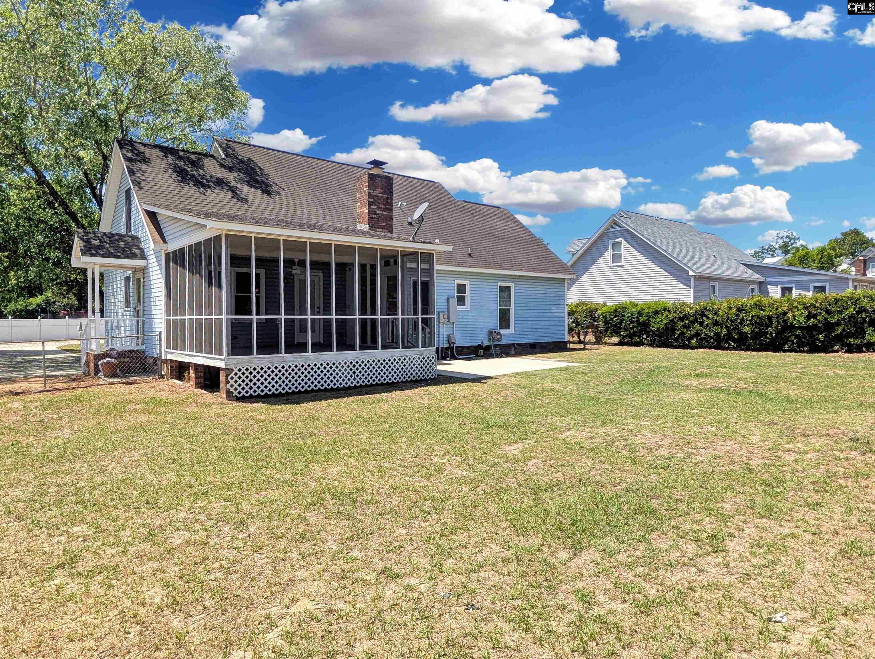 100 Welsh Court Lexington, SC 29073 - Photo 27 of 27 a view of a house with a yard and potted plants