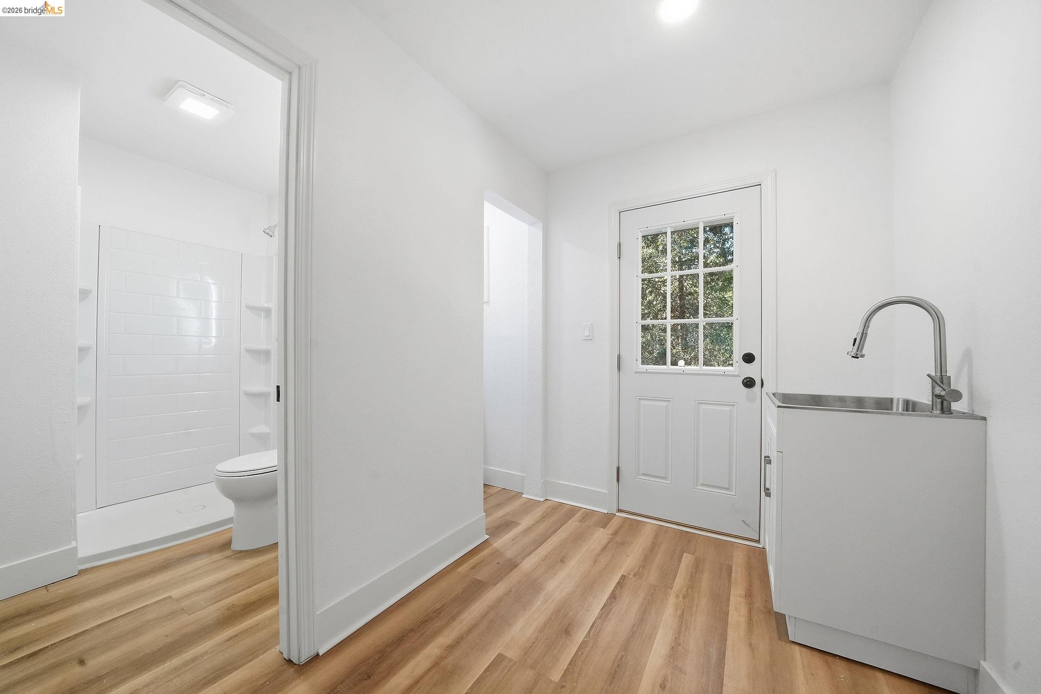 23656 Lightning Pioneer, CA 95666 - Photo 17 of 23 Doorway with wood finished floors and baseboards