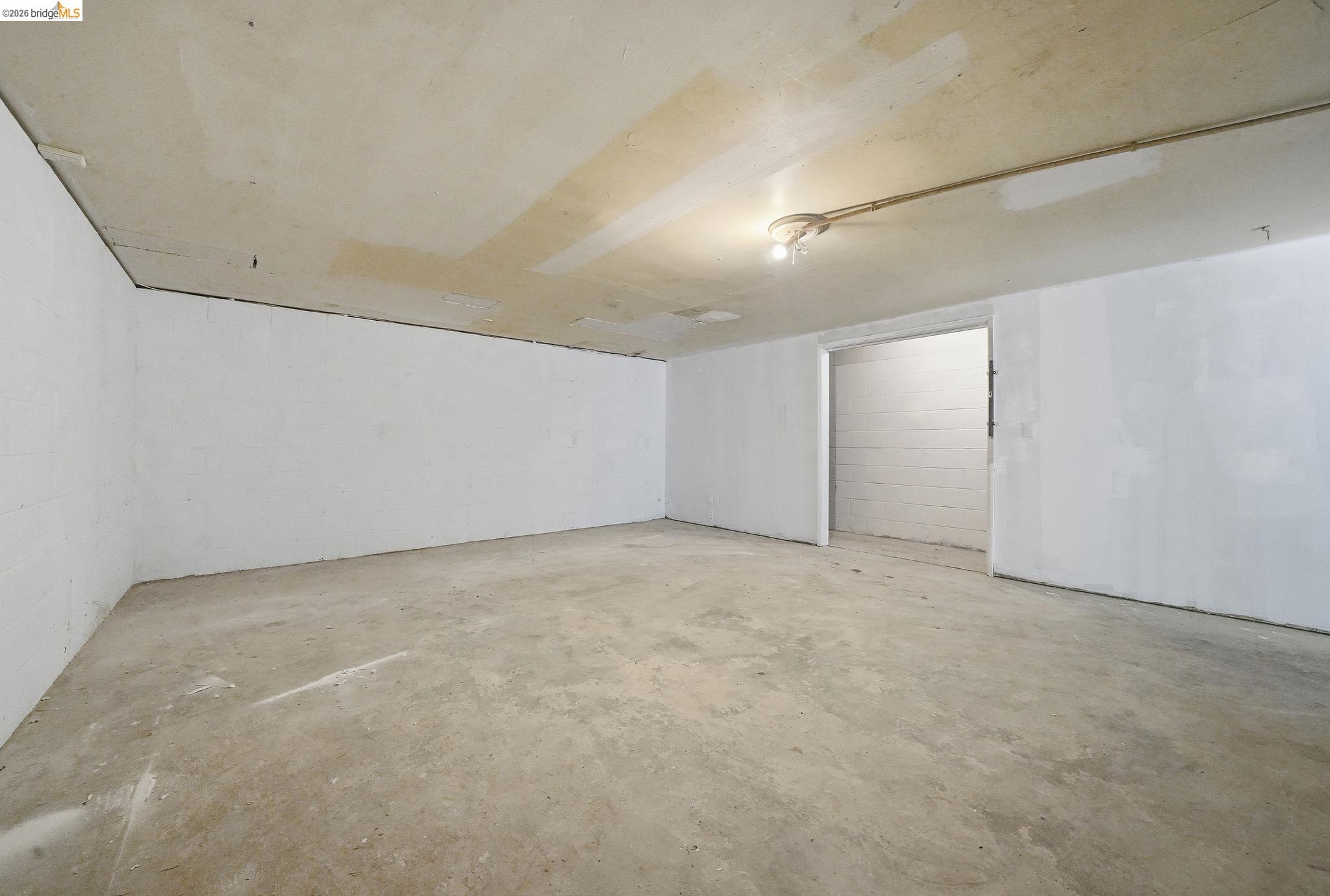 23656 Lightning Pioneer, CA 95666 - Photo 20 of 23 Unfinished basement featuring concrete block wall