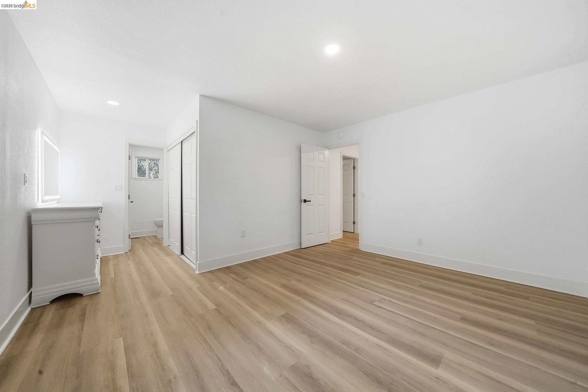 23656 Lightning Pioneer, CA 95666 - Photo 9 of 23 Unfurnished bedroom with light wood-type flooring, recessed lighting, and a closet