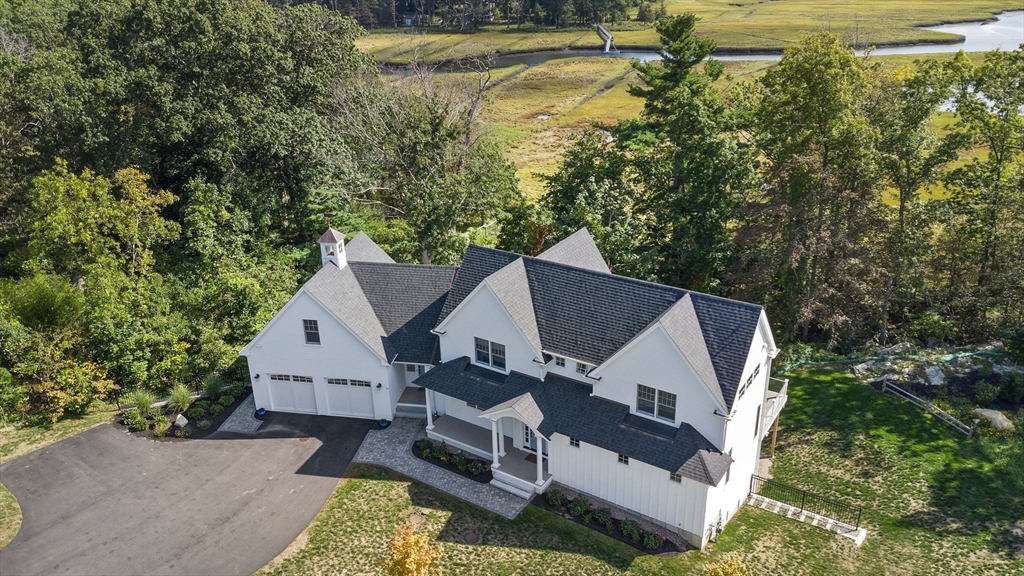 53 Border Street Scituate, MA 02066 - Photo 1 of 34 a view of a house with roof deck and garden