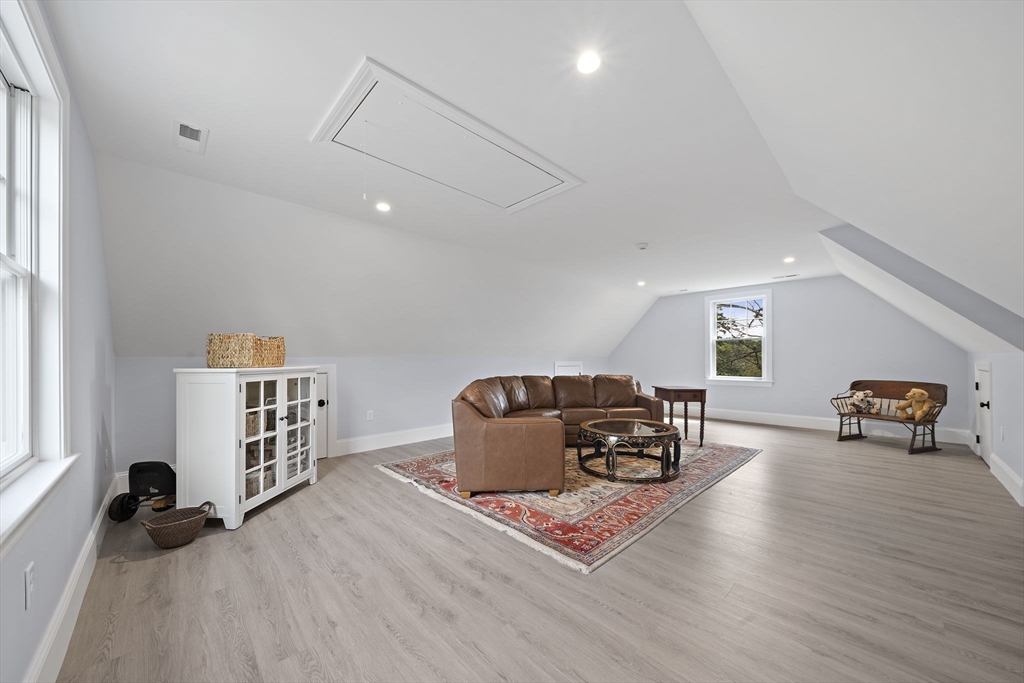 53 Border Street Scituate, MA 02066 - Photo 19 of 34 a living room with furniture and a flat screen tv