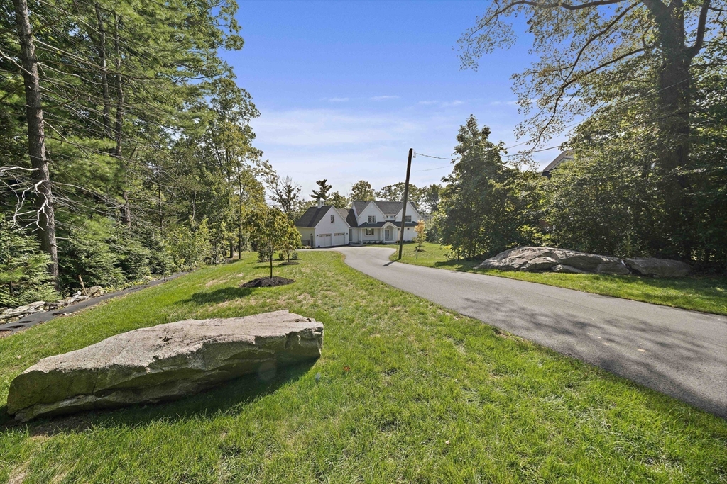 53 Border Street Scituate, MA 02066 - Photo 27 of 34 a view of a lake with a yard