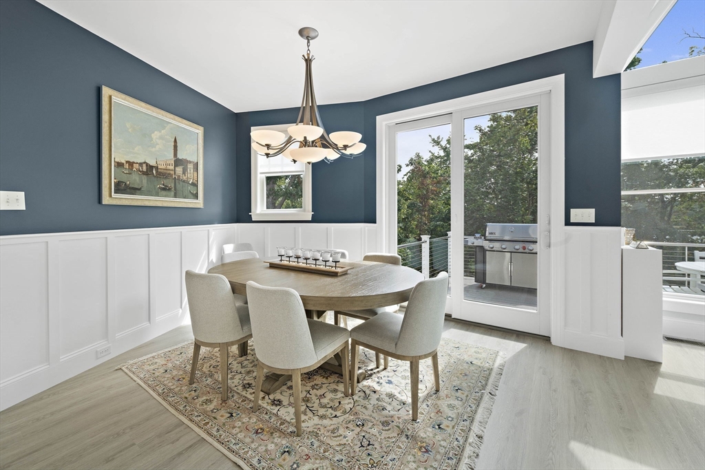 53 Border Street Scituate, MA 02066 - Photo 4 of 34 a view of a dining room with furniture window and wooden floor