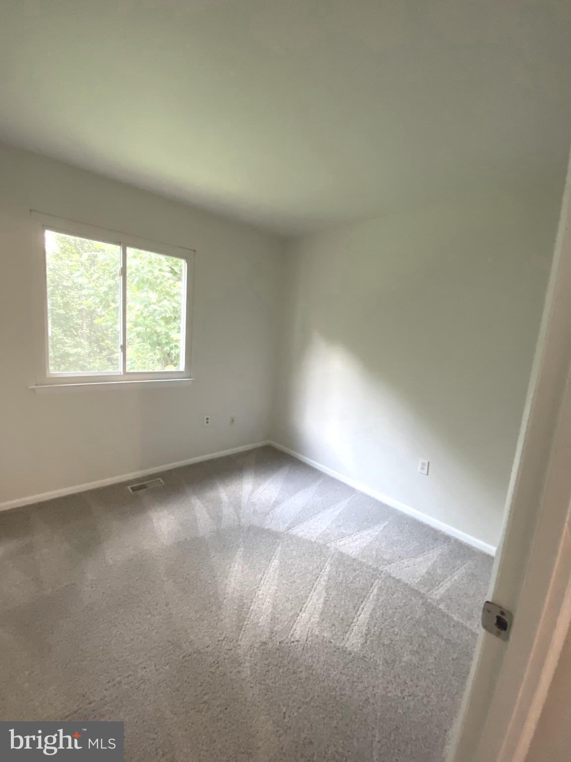 15947 Dorset Road, Unit 188 Laurel, MD 20707 - Photo 12 of 24 an empty room with windows