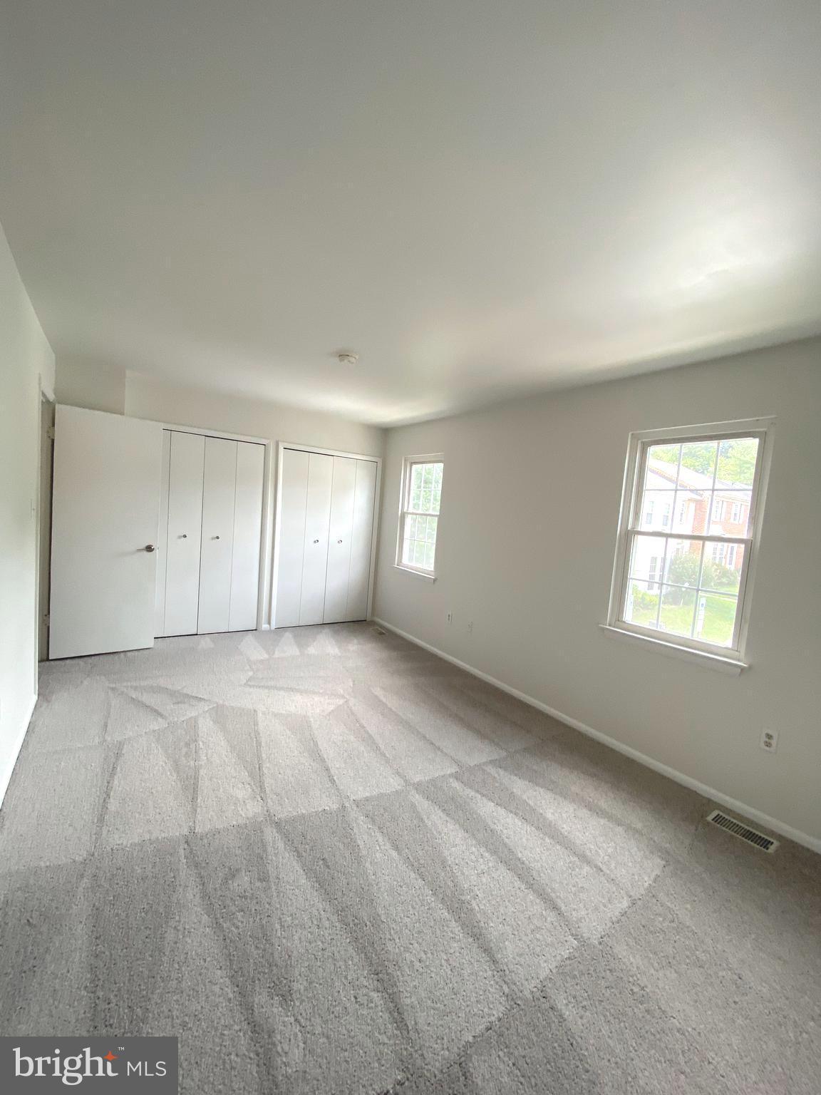 15947 Dorset Road, Unit 188 Laurel, MD 20707 - Photo 17 of 24 an empty room with windows