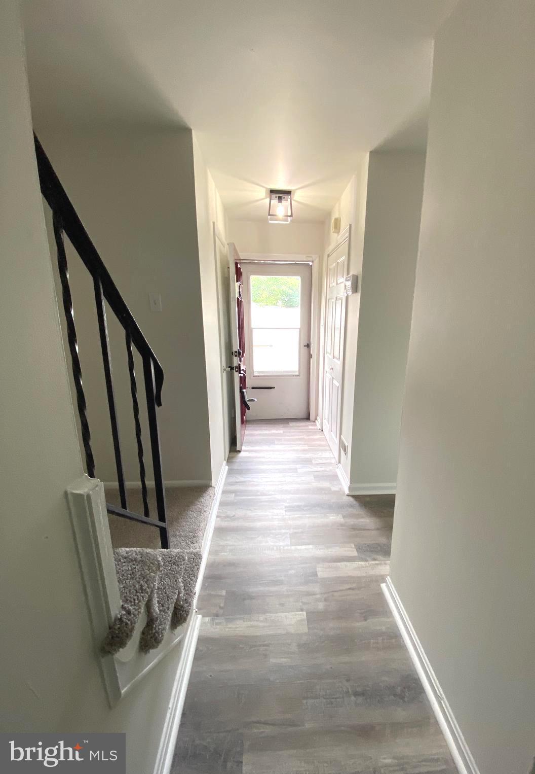 15947 Dorset Road, Unit 188 Laurel, MD 20707 - Photo 2 of 24 a view of a hallway view with staircase