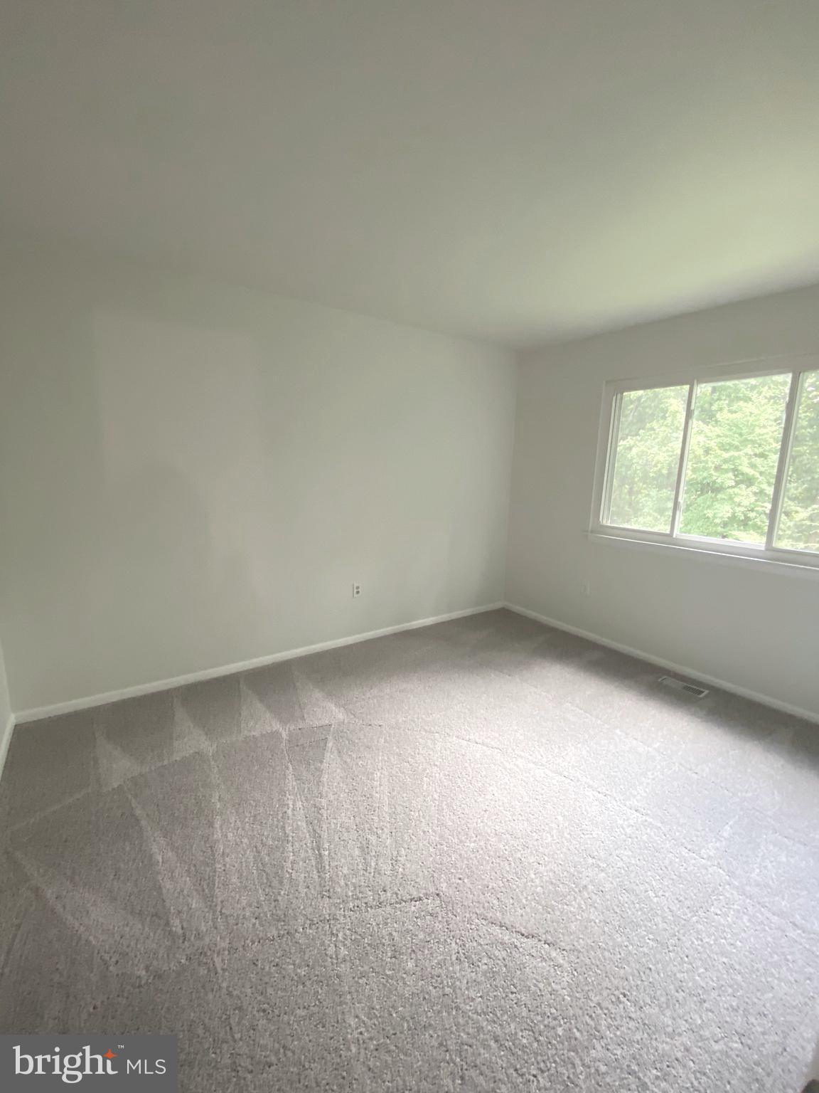 15947 Dorset Road, Unit 188 Laurel, MD 20707 - Photo 10 of 24 an empty room with a window