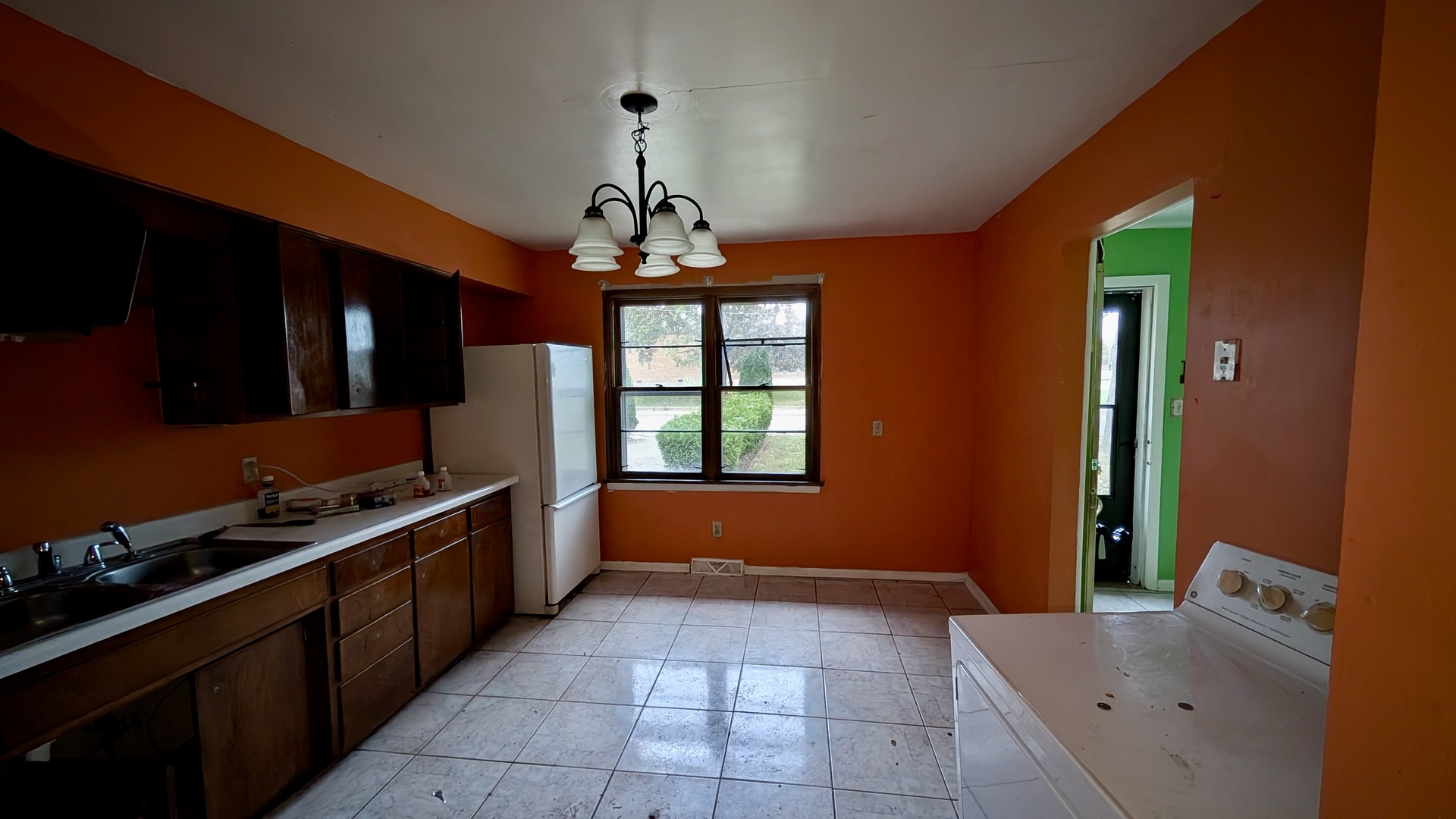 639 Wood Court Kankakee, IL 60901 - Photo 12 of 43 a kitchen with stainless steel appliances granite countertop a stove and a sink