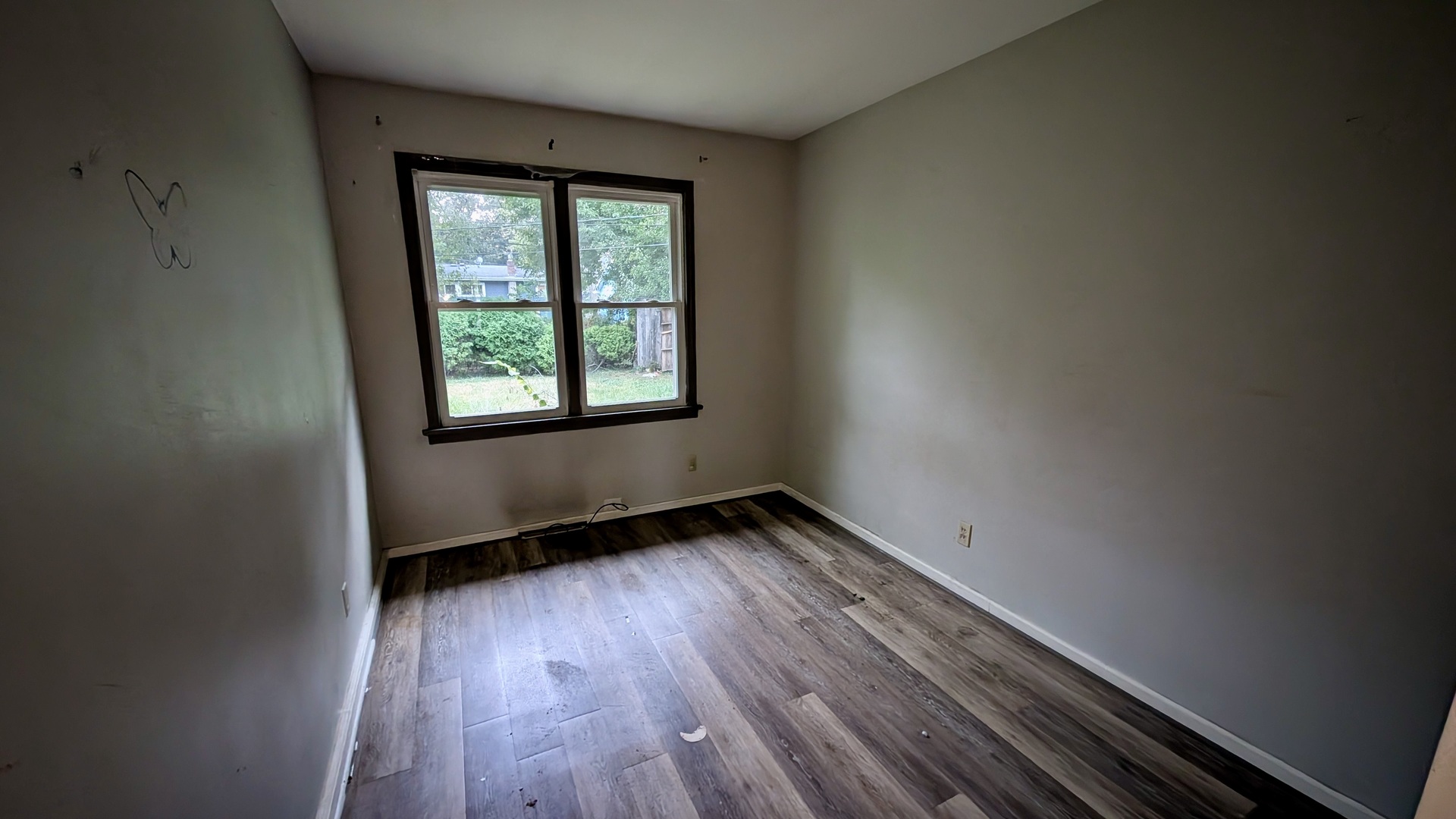 639 Wood Court Kankakee, IL 60901 - Photo 19 of 43 an empty room with wooden floor and windows