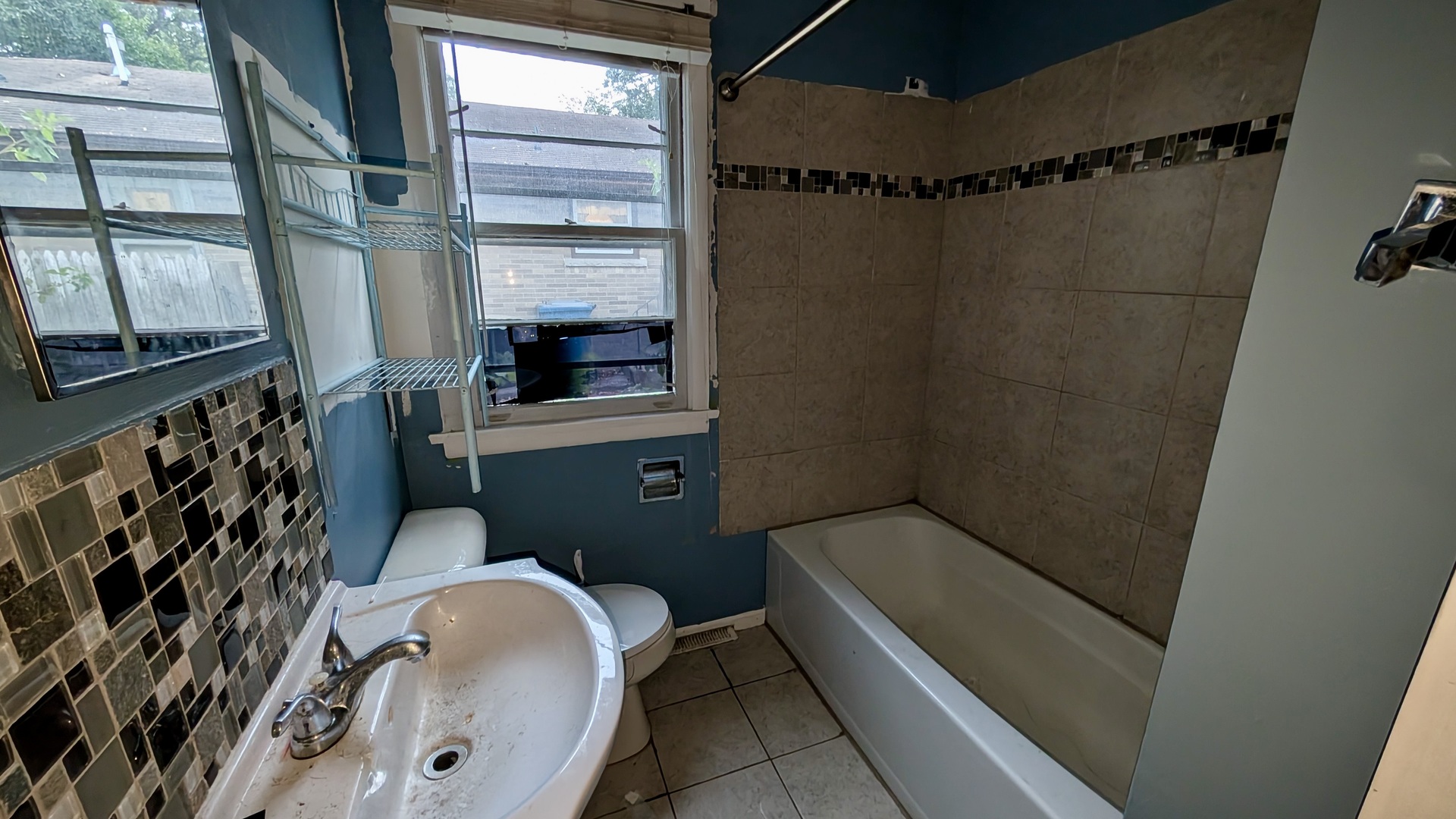 639 Wood Court Kankakee, IL 60901 - Photo 23 of 43 a bathroom with a granite countertop sink toilet and shower