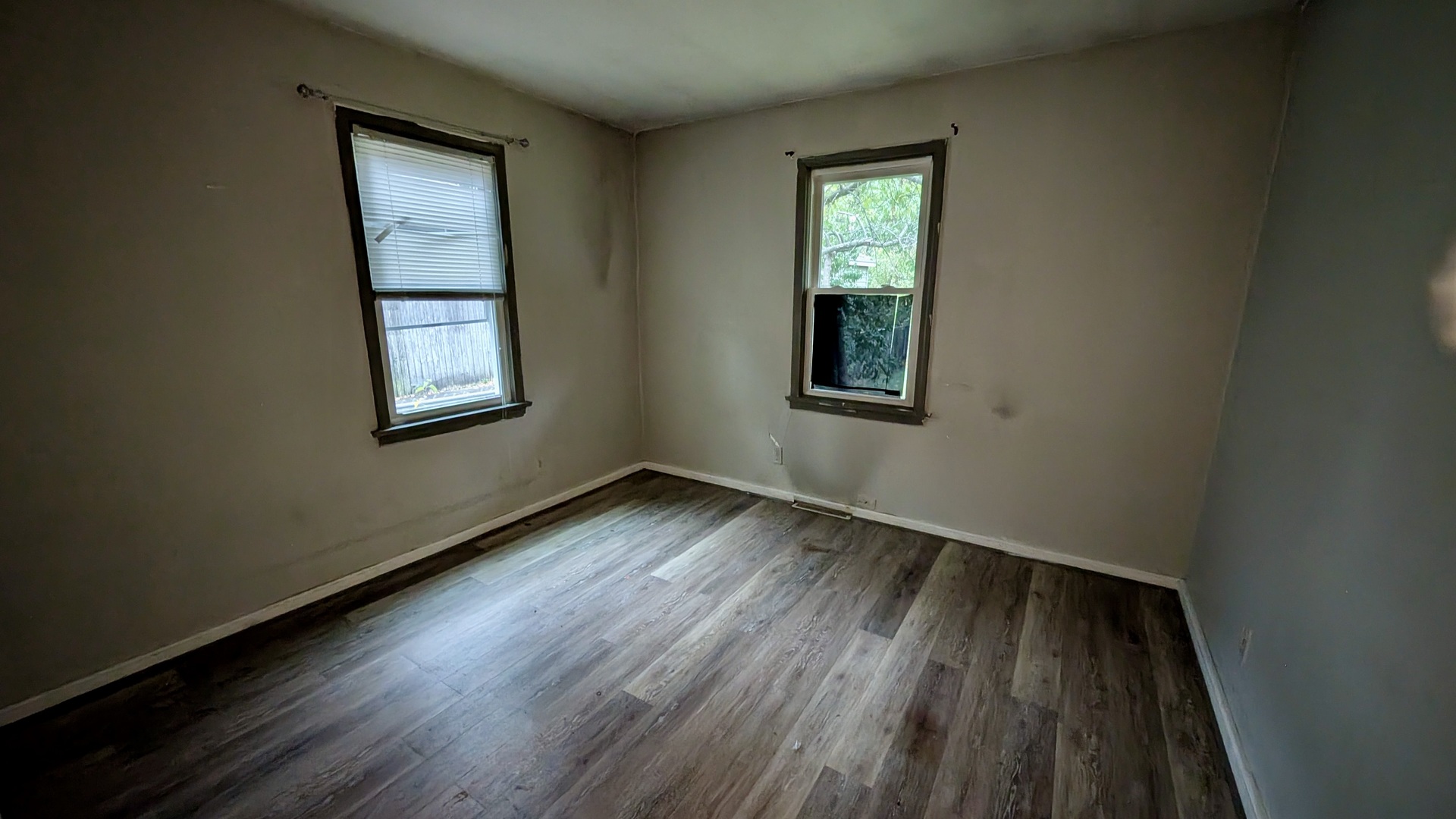 639 Wood Court Kankakee, IL 60901 - Photo 25 of 43 an empty room with wooden floor and windows