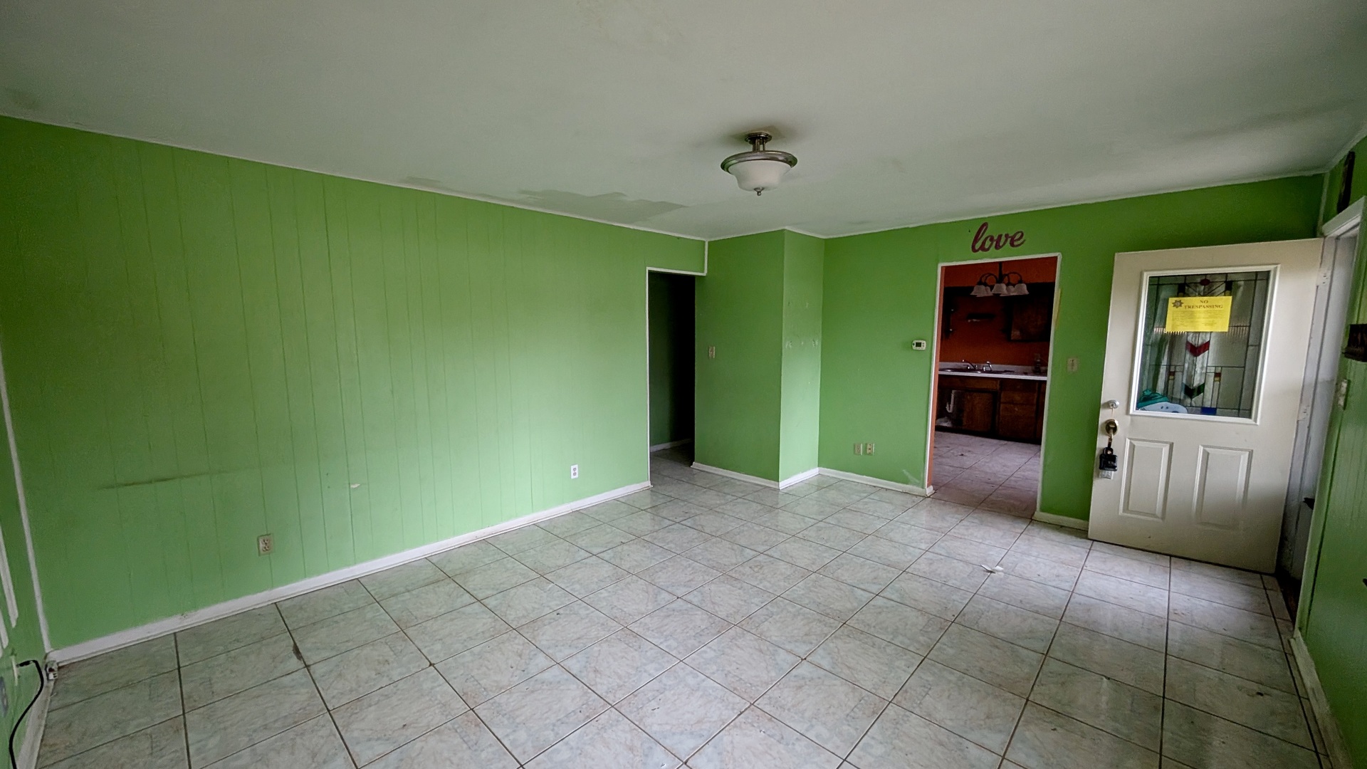 639 Wood Court Kankakee, IL 60901 - Photo 5 of 43 a view of a livingroom with an empty space and a window