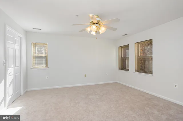 a bathroom with a sink vanity and a mirror