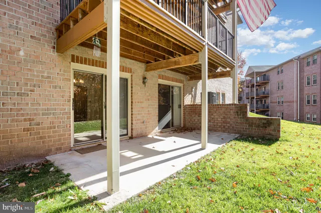 front view of a building with a yard