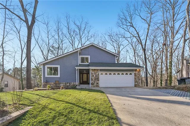 front view of a house with a yard