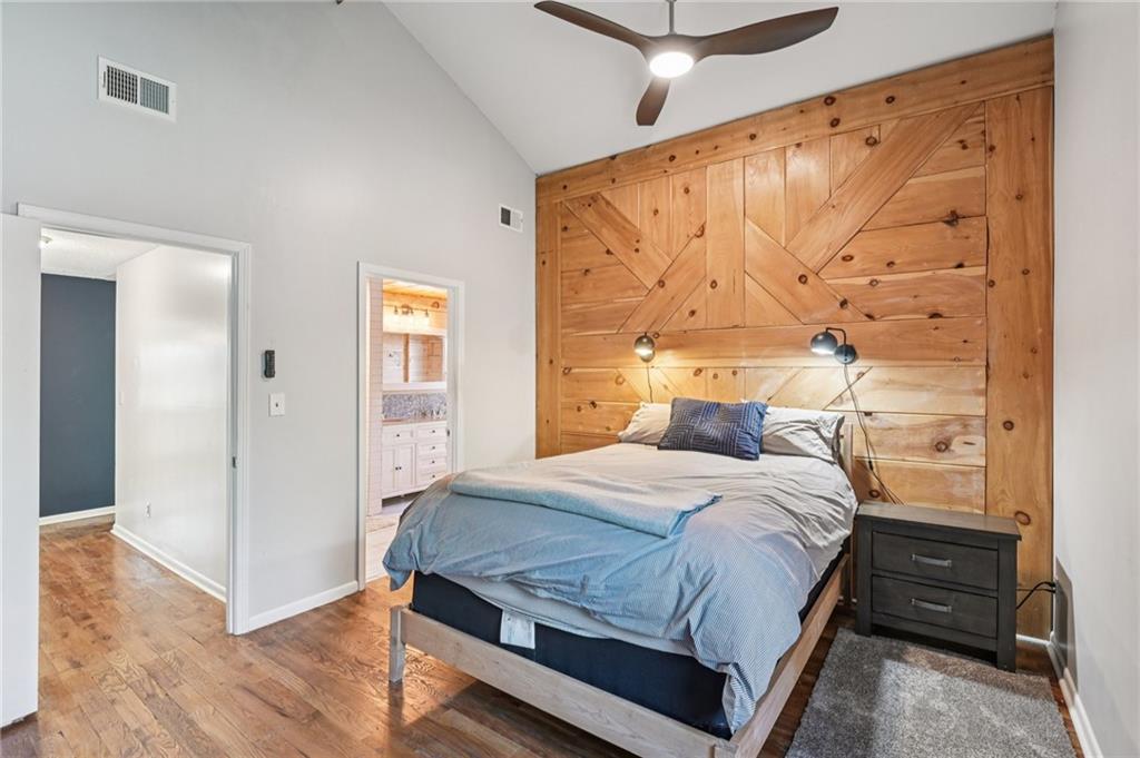 9485 Martin Road Roswell, GA 30076 - Photo 13 of 33 a bedroom with a bed and a window