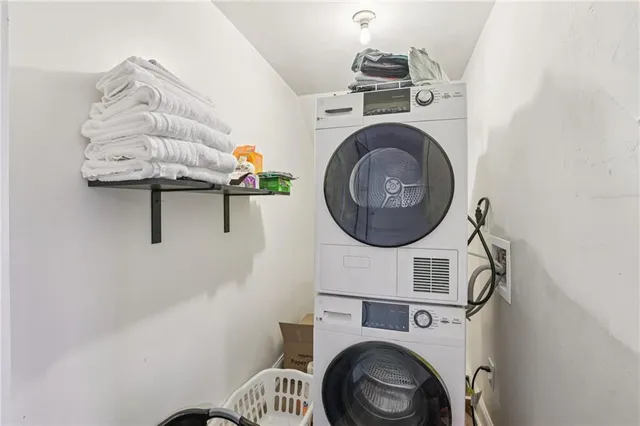 a view of washer and dryer in a utility room
