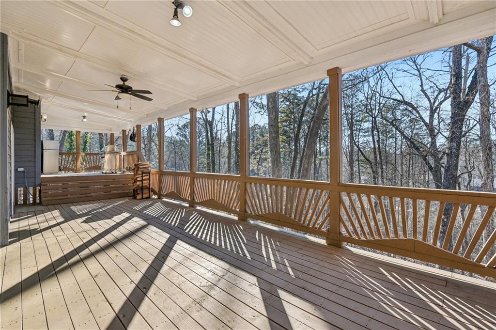 9485 Martin Road Roswell, GA 30076 - Photo 25 of 33 a view of a balcony with wooden floor