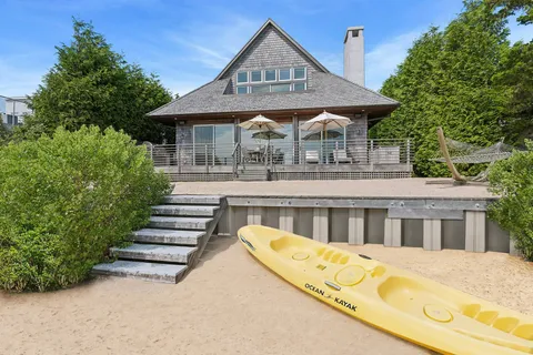 a front view of a house with swimming pool