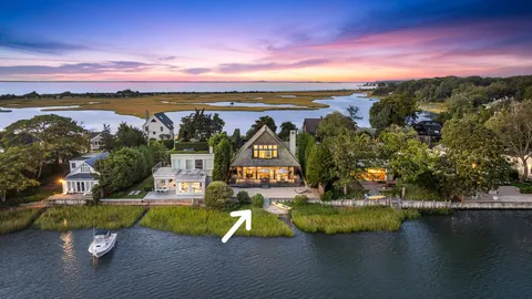 a view of a lake with houses