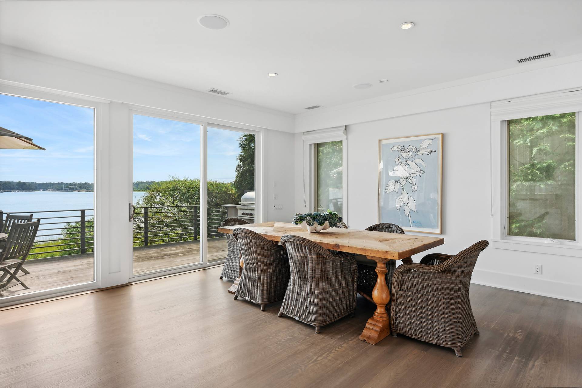 210 Towd Point Road Southampton, NY 11968 - Photo 6 of 21 a living room with furniture and wooden floor