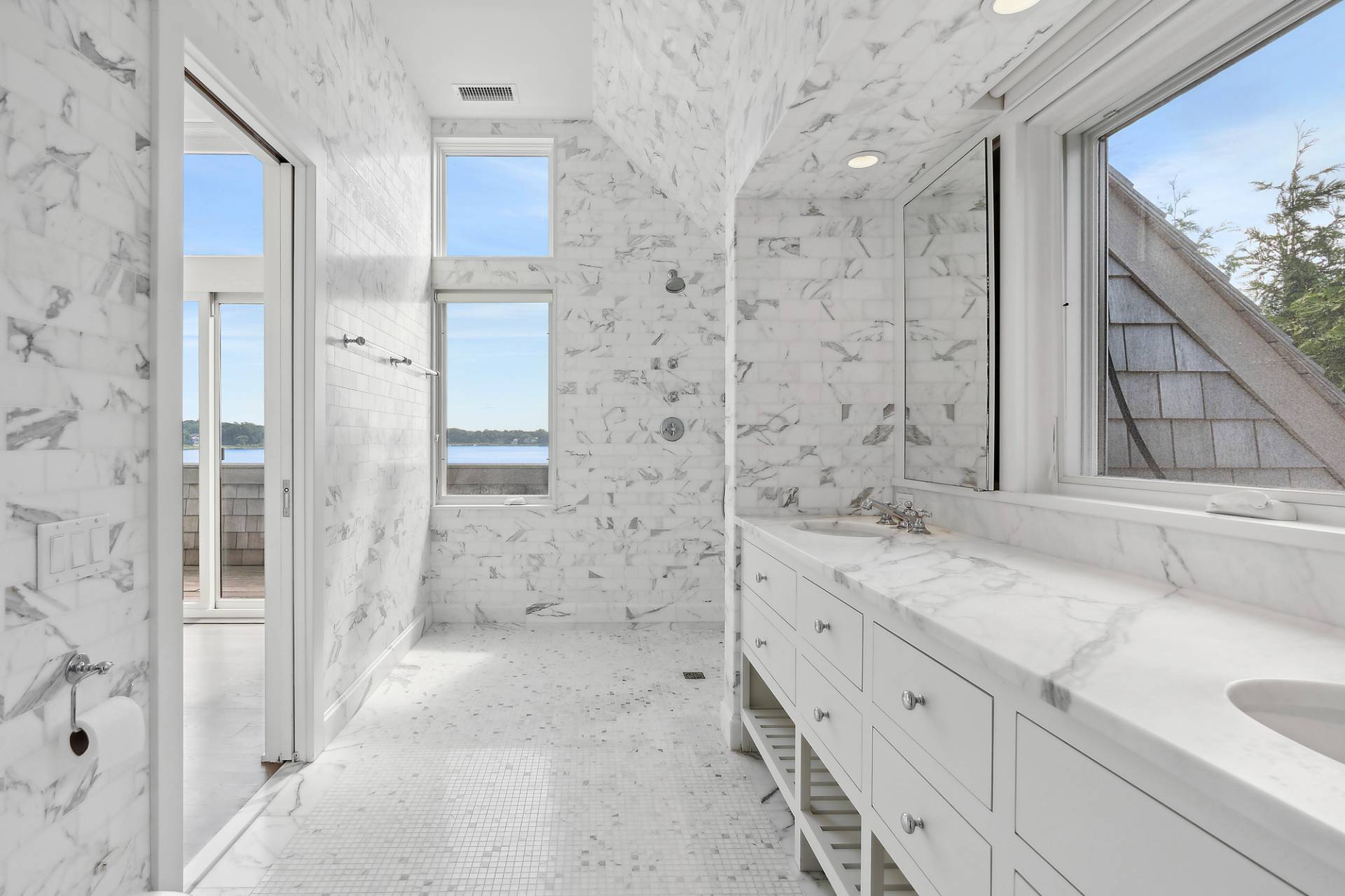 210 Towd Point Road Southampton, NY 11968 - Photo 10 of 21 a bathroom with a granite countertop sink mirror and shower