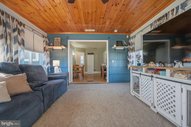 a room that has a sink and a bed