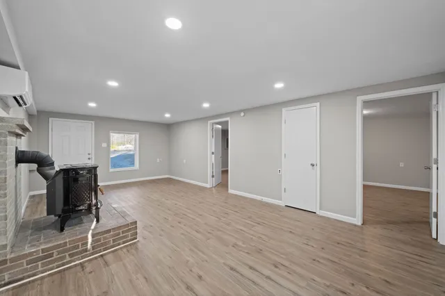 a kitchen with a sink stove and refrigerator