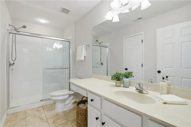 a bathroom with a sink a vanity and a mirror